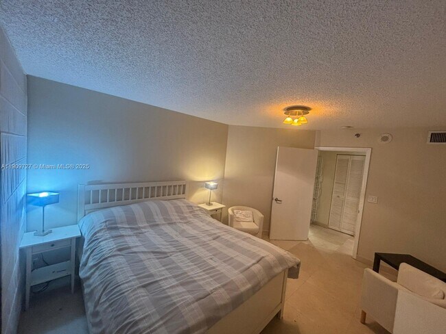 Building Photo - 8911 Collins Ave