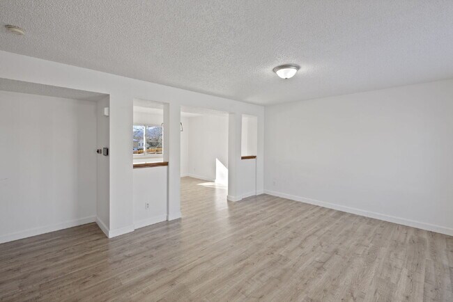 Building Photo - Spacious 6-Bedroom / 3.5-Bath Home — Great Location + Solar Savings!