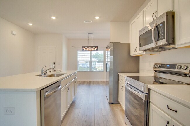 Building Photo - 3BR/2BA Home Near Navy Federal Featuring Quartz Counters, 2-Car Garage & Internet Included