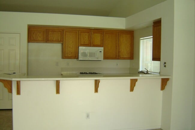 Building Photo - Spacious single-level home located on a quiet corner lot in a well-established Oceanside neighbor...