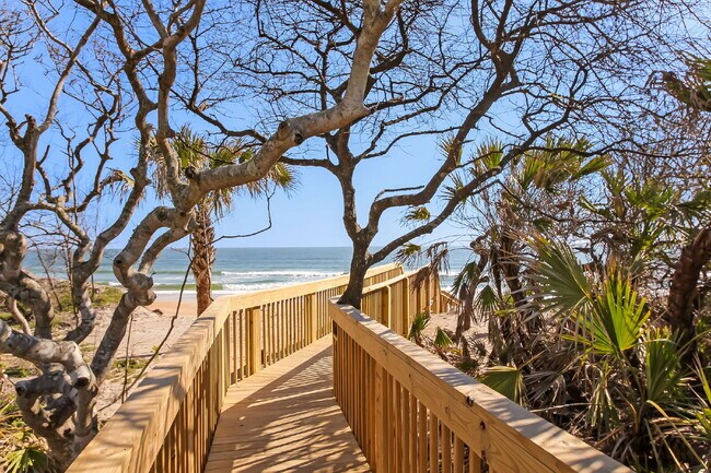 Building Photo - Coastal Living Just 2 Blocks from the Beach | Gated Community + Resort Amenities