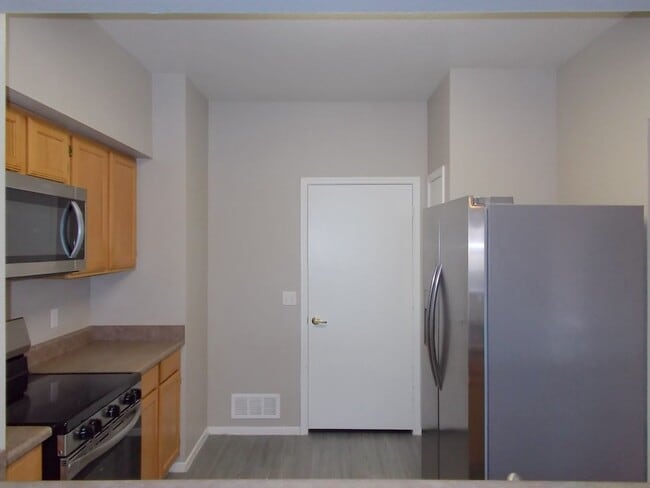 Building Photo - Bright Ground-Floor Condo in Gated Traverse Point with Pool & Spa Amenities