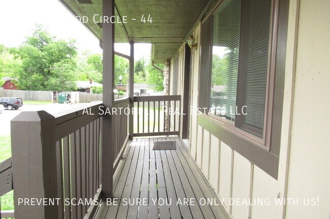 Building Photo - Pet Friendly Condo close to town and ready...