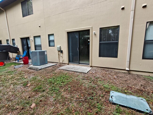 Building Photo - Spacious 2-Bed, 2.5-Bath Townhome with Gar...