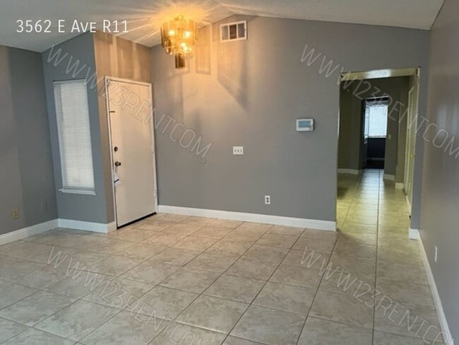 Building Photo - 3562 E Ave R-11