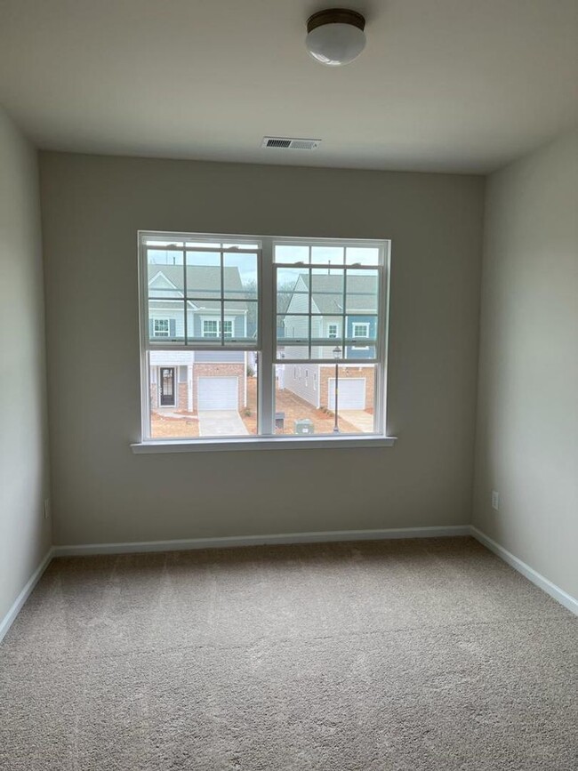 Building Photo - Townhome with 3BR/2.5BA Garage Located in ...