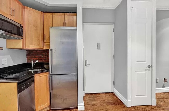 Building Photo - 219-221 E 23rd St