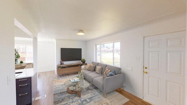 Building Photo - Renovated Park Hill brick home with large backyard