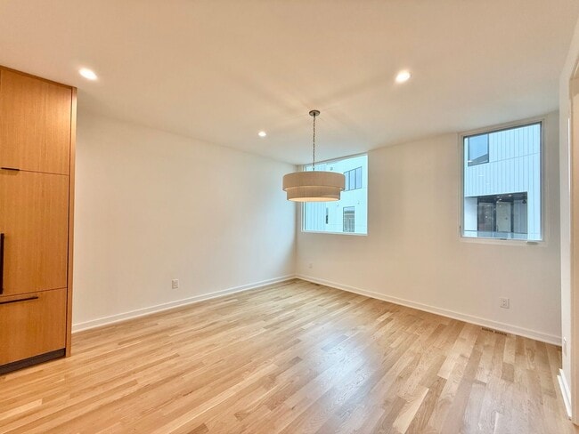 Building Photo - Luxurious New Construction 4BD, 2.5BA Raleigh Townhome with a Rooftop Terrace in a Prime Location...