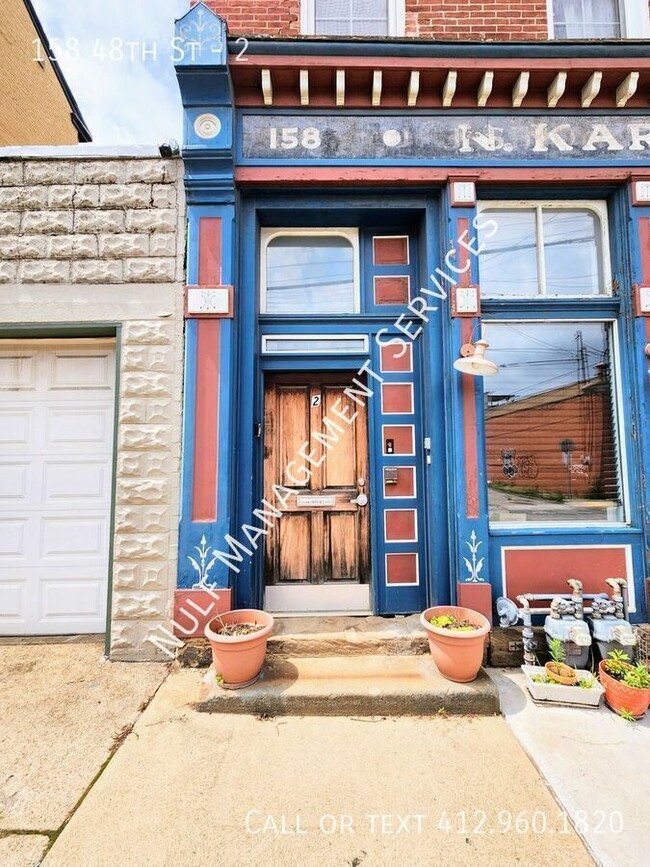 Building Photo - 158 48th St