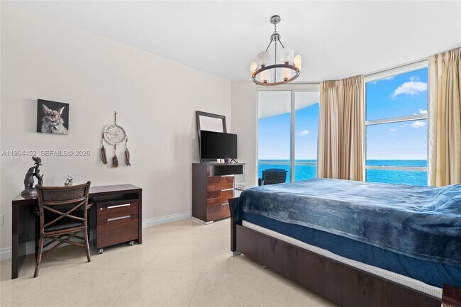 Building Photo - 16047 Collins Ave