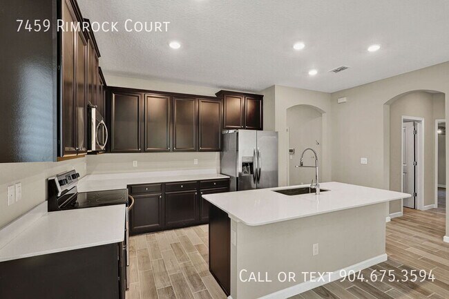 Building Photo - 7459 Rimrock Ct