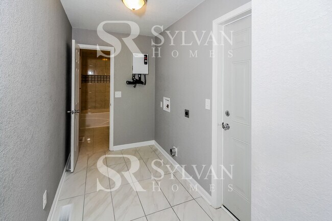 Building Photo - Turn the key. Enter. Smile. Repeat every day!