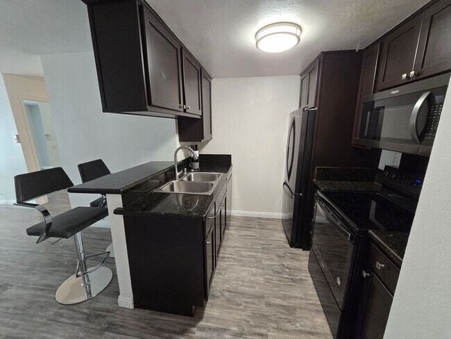 Building Photo - Convenient 2BR/2BA Condo Near SDSU at Campus Walk Condos