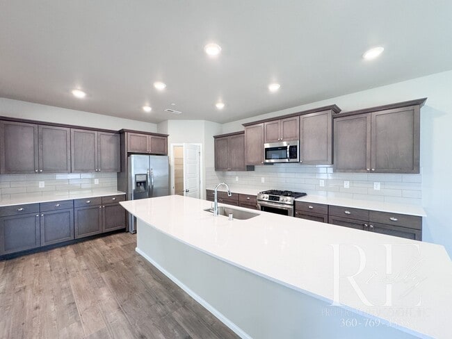 Building Photo - Luxury 4-Bedroom Home with Loft, 10' Ceilings, Gourmet Kitchen & Premium Upgrades