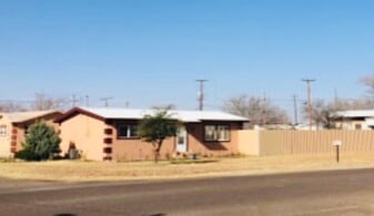 Home, front loan, backyard fence - 304 SE 2nd St