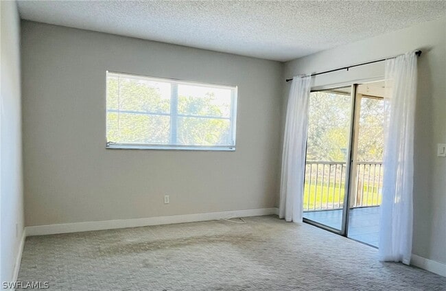 Building Photo - 4912 Tamiami Trl E