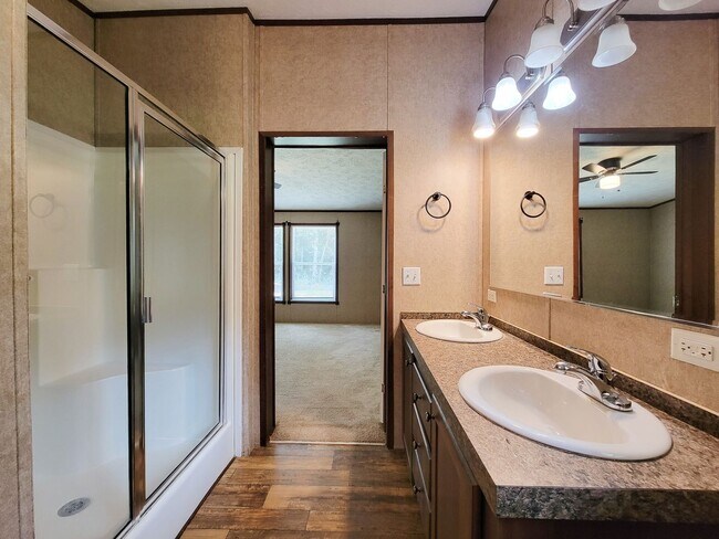 Building Photo - Cozy and Adorable home 4 bedroom 2 bath home on over 1 acre near McRae Lake! Relax on the covered...