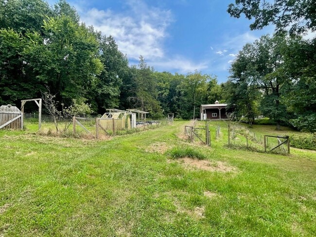 Building Photo - Unique 4 Bedroom Home on Dead-End Road w/ 6 Acres