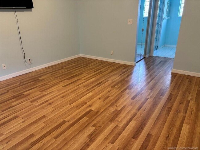 Building Photo - 3486 SW Pindo Palm Ln