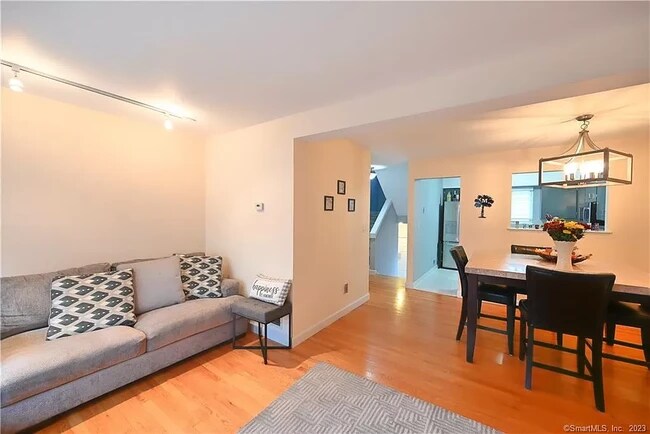 Living Room and Dining Room - 95 Country Pl