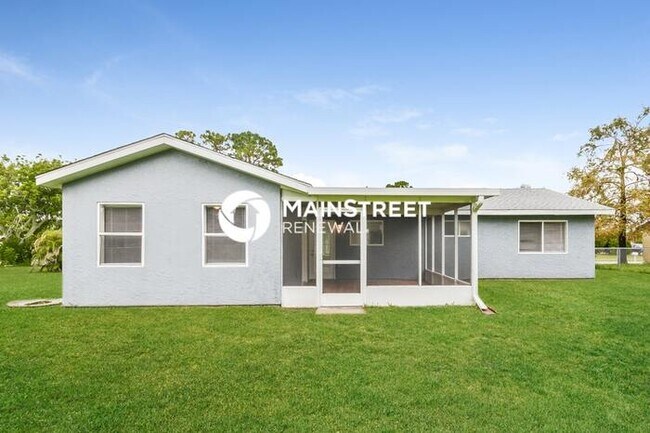 Building Photo - 4 Bedroom Pet-Friendly Home in NORTH PORT, FL with Main Street Renewal