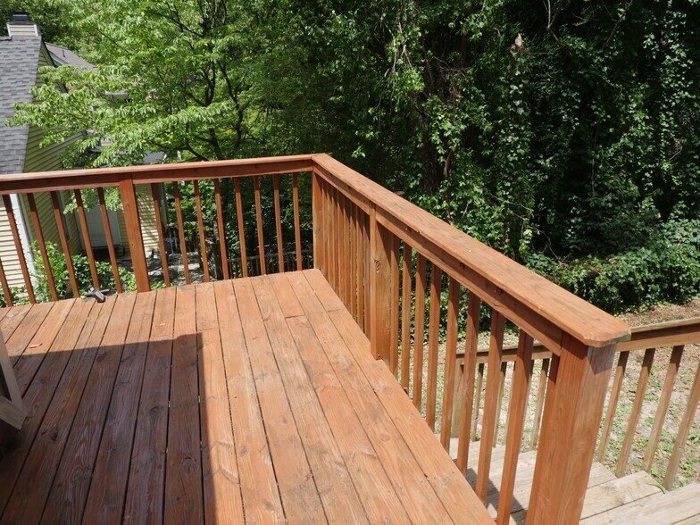 Stained back deck and backyard - 1065 Atlantic Dr NW