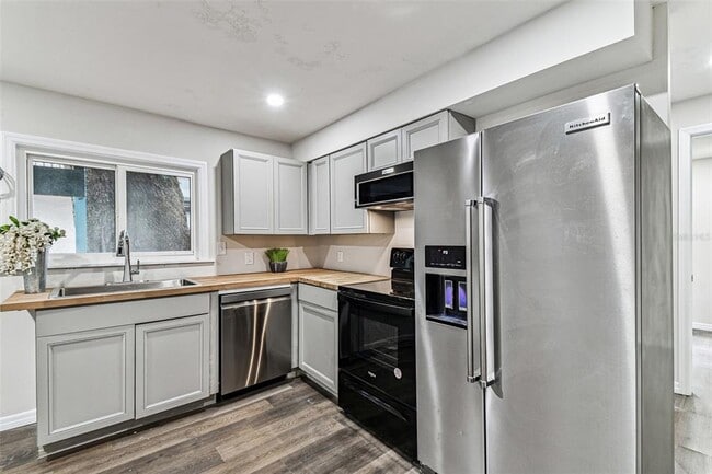 Building Photo - 1006 E 26th Ave