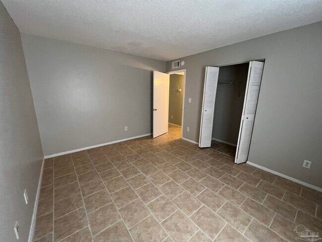 Building Photo - 6809 Tiki Ln