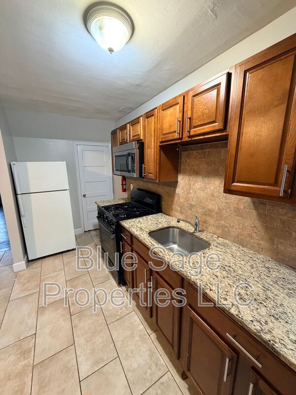 Building Photo - 7026 Radbourne Rd