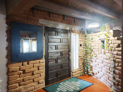 Entryway with adobe walls - 11 Quail Meadow Rd