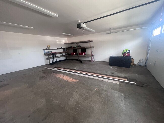 Building Photo - 2 Bedroom 1 bath house with extra large double car garage and extra storage space!
