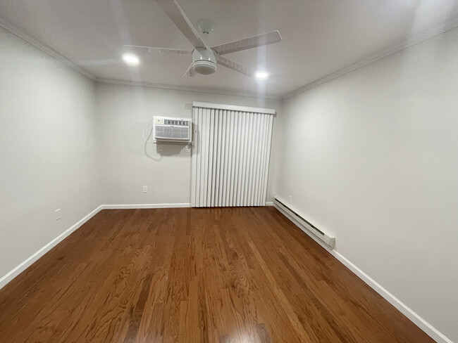 Bedroom with Vertical Blinds - 1382 Ocean Ave