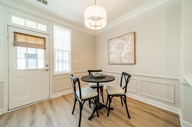 Building Photo - UPGRADES! Two Bedroom Townhouse - Six Mont...