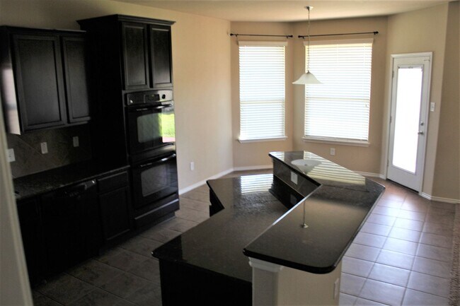 Building Photo - Over 3000 square feet with 3 car garage!