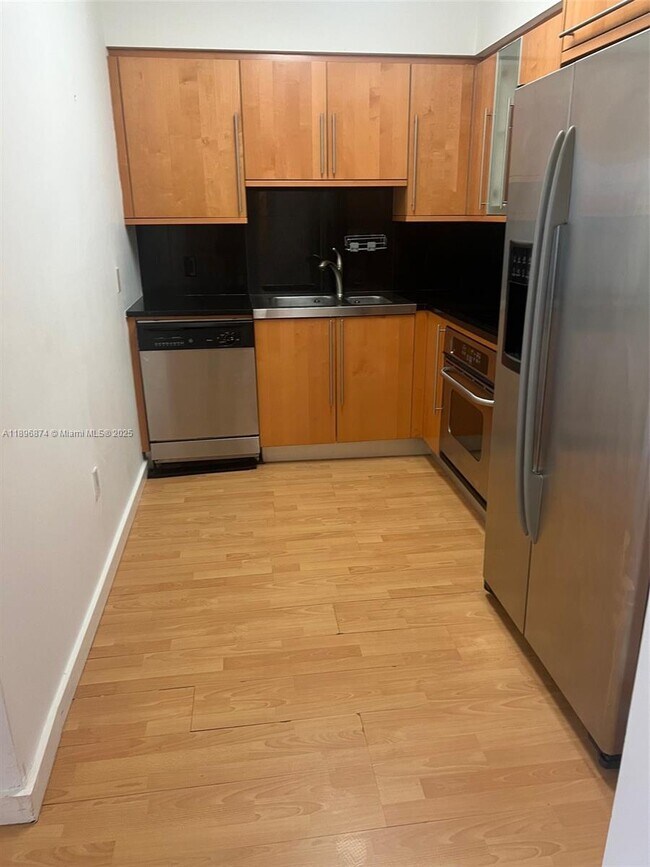 Building Photo - 6365 Collins Ave