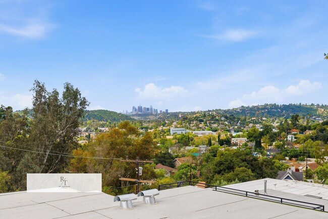 Building Photo - Luxury Modern Living with Stunning LA Skyline Views