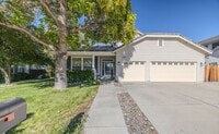 Building Photo - Welcome to this STUNNING 4-bedroom, 2.5-ba...