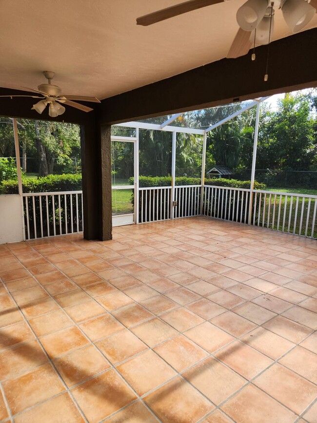 Building Photo - Charming Home With Lanai, Fenced-in Yard, ...