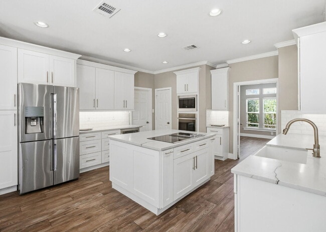 Building Photo - Updated two story. Gated subdivision. Gorgeous patio and yard!
