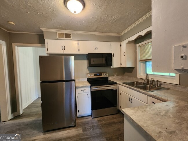 Building Photo - 4499 Childress St