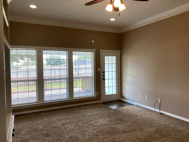 Building Photo - FABULOUS THREE BEDROOM HOME WITH LARGE DECK, FIREPLACE AND FLEX ROOM