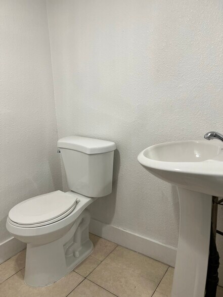 Building Photo - 8569 Remmet Ave