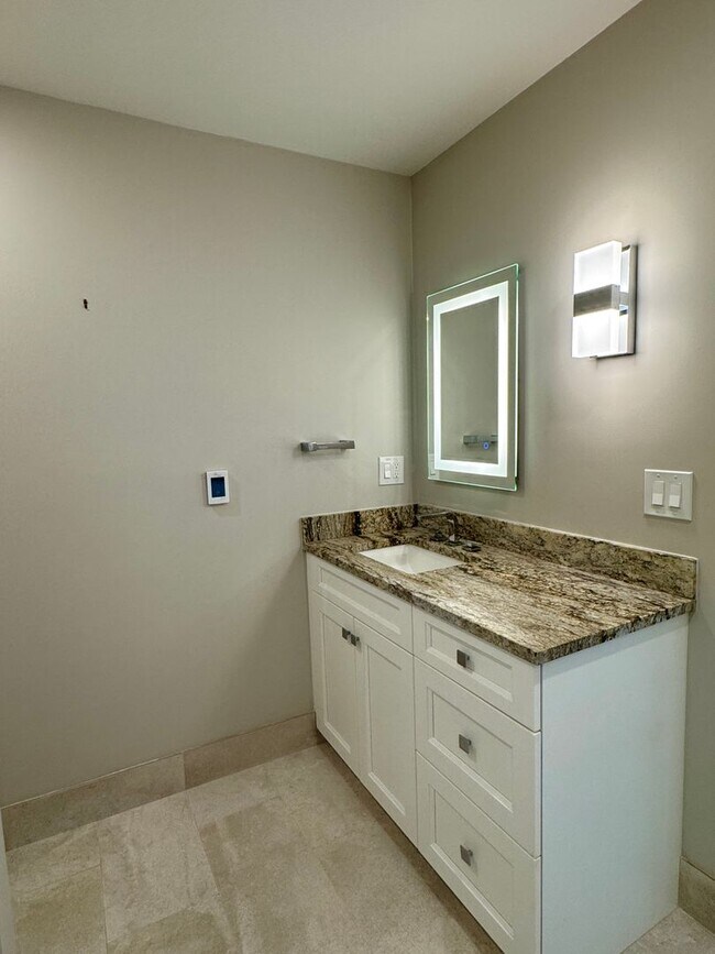 Building Photo - Stunning completely remodeled waterfront P...