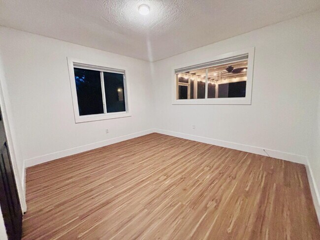 Building Photo - Coastal 4-Bedroom Oasis – Walk to the Beach!