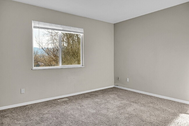 Building Photo - $1,745.95 -  2 Bed, 2 Bath Townhome in CO Springs with In Unit Laundry and Attached Garage!