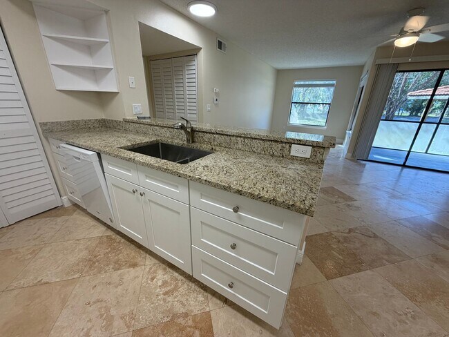 Building Photo - ANNUAL RENTAL - OASIS - 1 BED/1 BATH