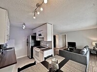Building Photo - Furnished Cozy 1 Bedroom / 1 Bath Condo - ...