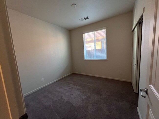 Building Photo - Freshly painted home with new carpet.