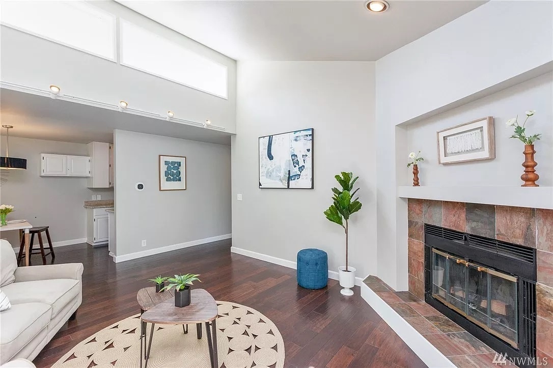 Natural wood fireplace - 9800 Roosevelt Way NE
